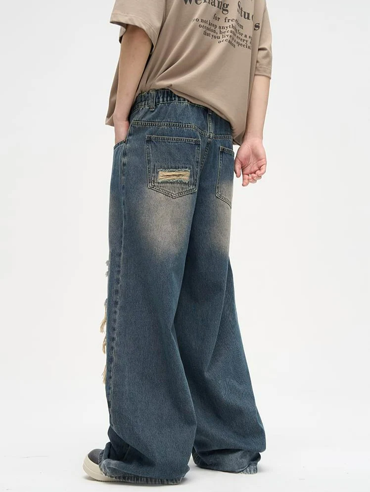 Faded Distressed Patchwork Jeans - Image 9