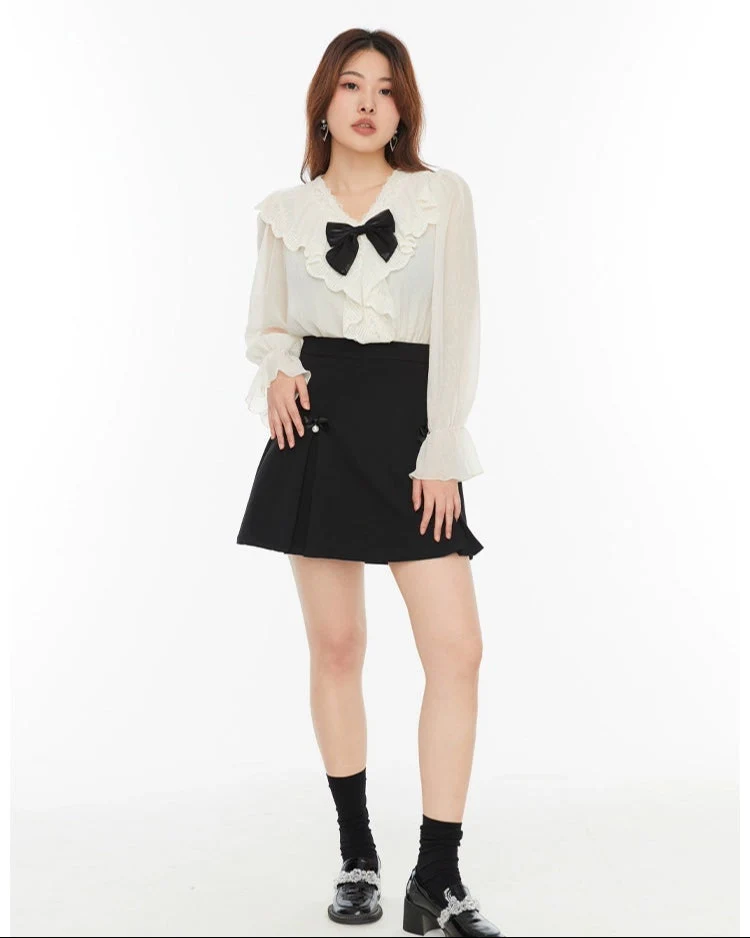 Pleated Mini Skirt with Bow and Faux Pearl Accents - Image 7
