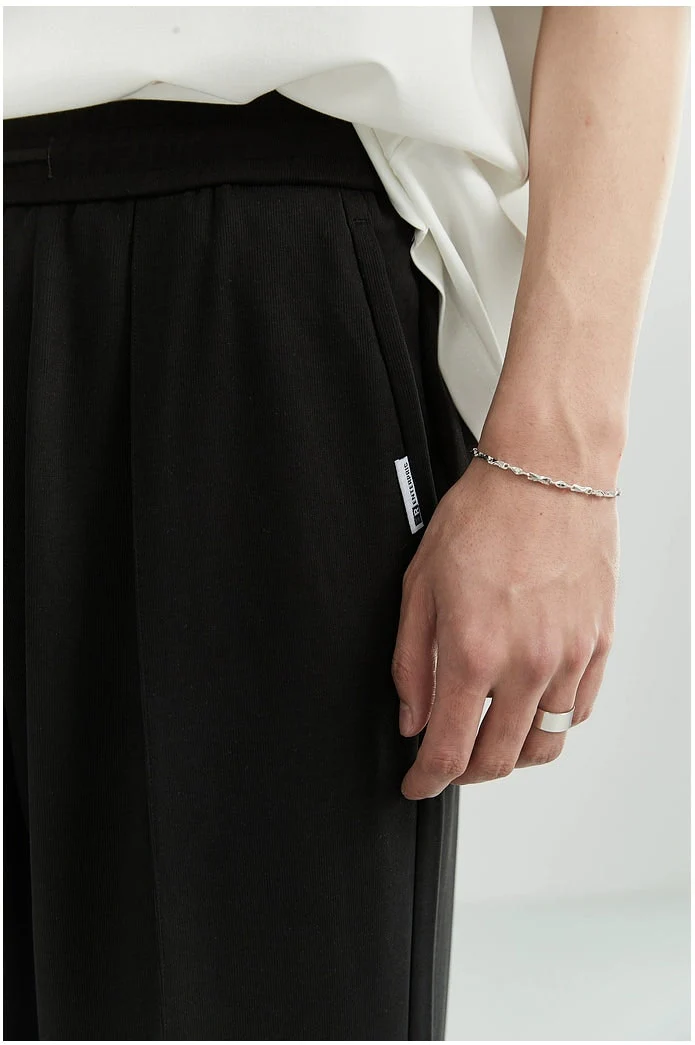 Slim Pleated Tapered Trousers with Pockets - Image 11