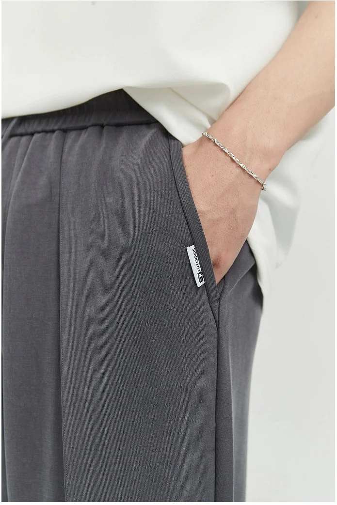 Slim Pleated Tapered Trousers with Pockets - Image 25